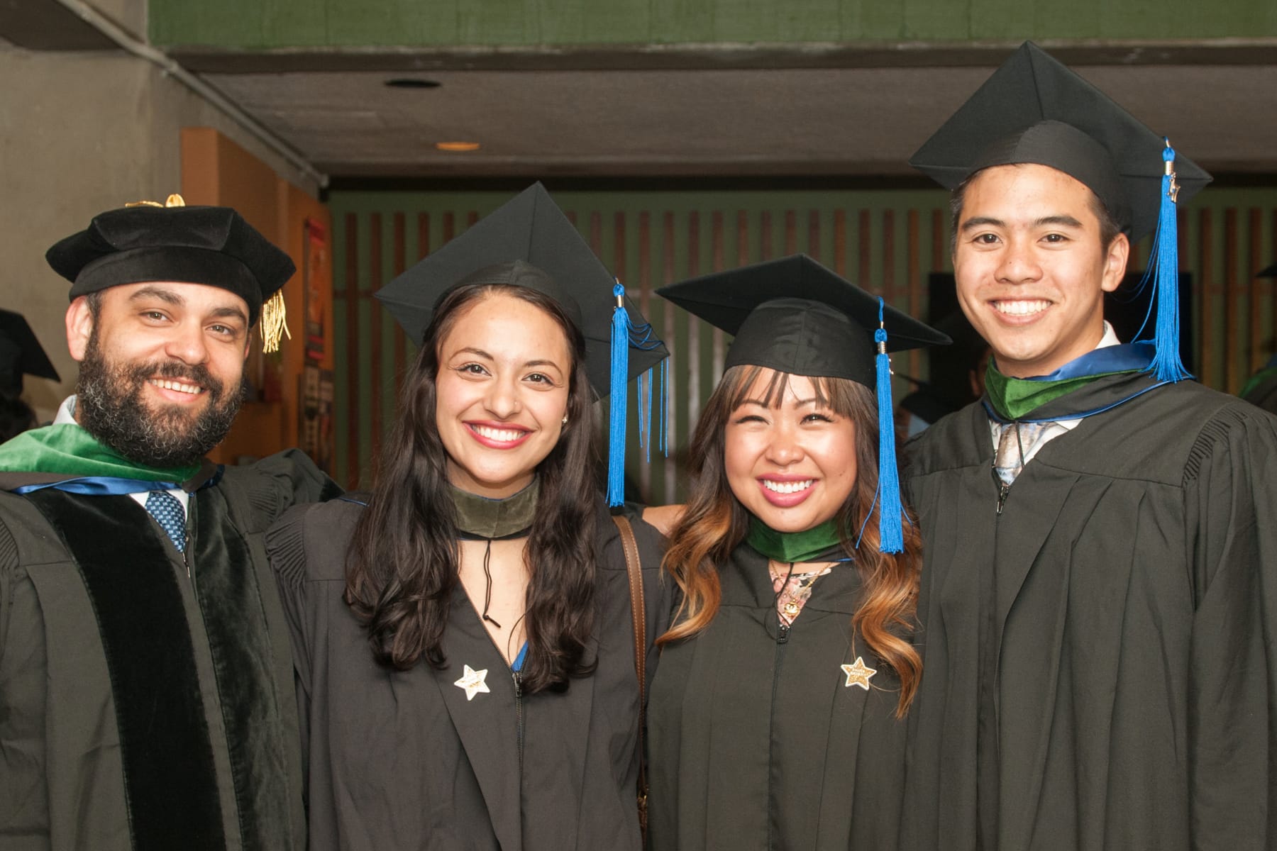 group of graduating students in caps and gowns