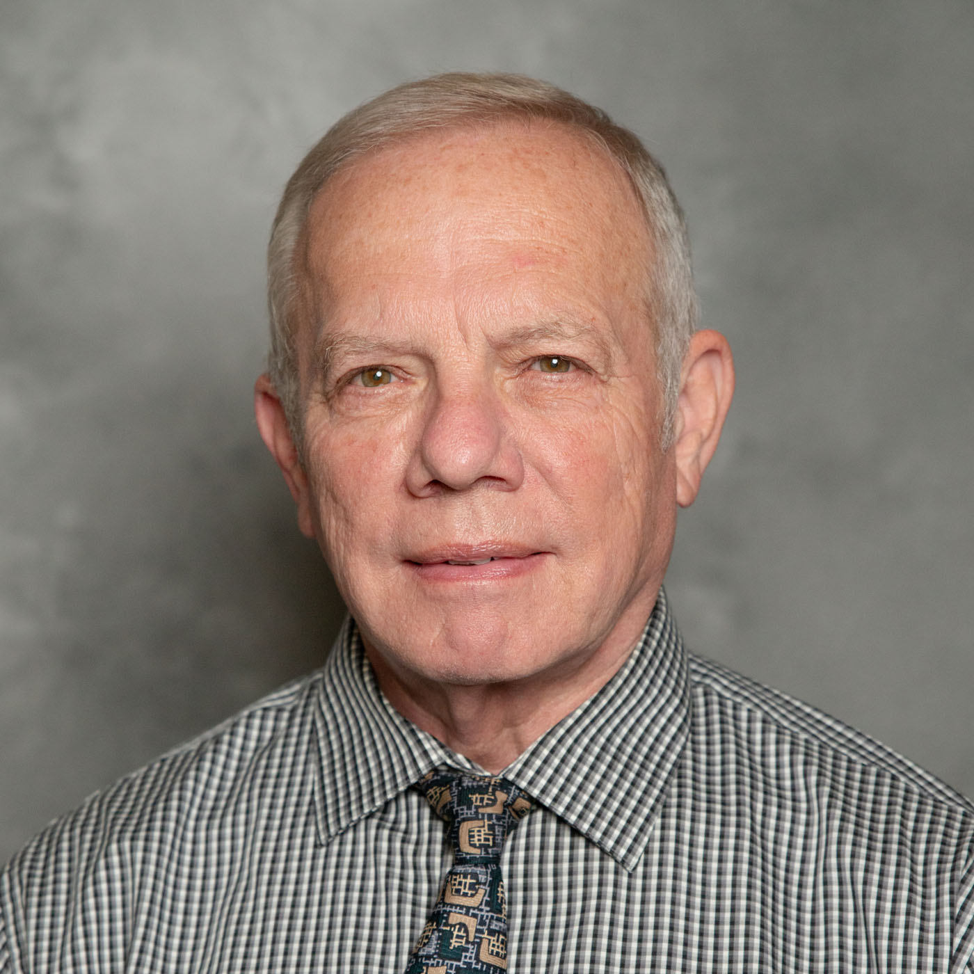 Headshot of John Ellis